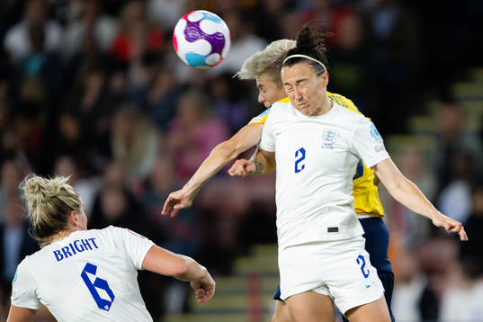 Lina Hurtig of Sweden and Lucy Bronze of England