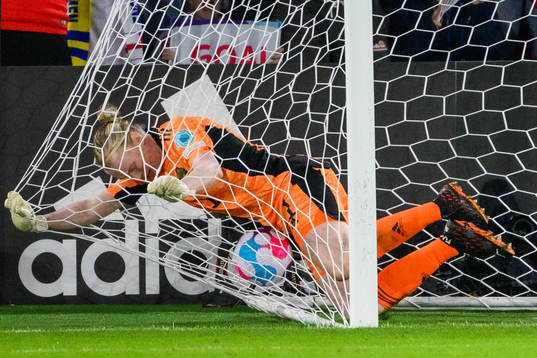 Goalkeeper Hedvig Lindahl of Sweden crashes into the net