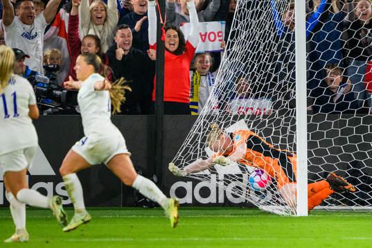 Fran Kirby of England celebrates while goalkeeper Hedvig