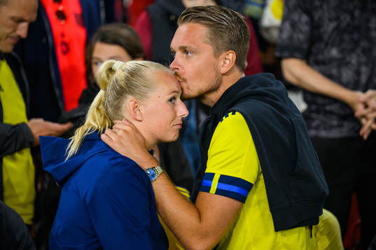 Stina Blackstenius of Sweden is comforted by family in the