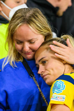Fridolina Rolfö of Sweden is comforted by family in the
