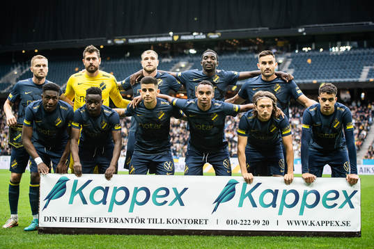 Players of AIK line up for a team photo