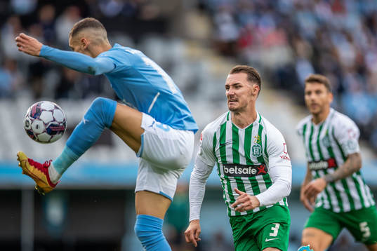 Veljko Birmancevic of Malmö FF and Mario Pavelic of