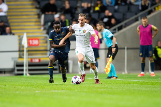 Erick Otieno Ouma of AIK and of Vorskla Poltava Igor Perduta
