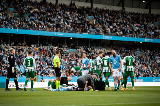Ola Toivonen of Malmö FF receives medical attention