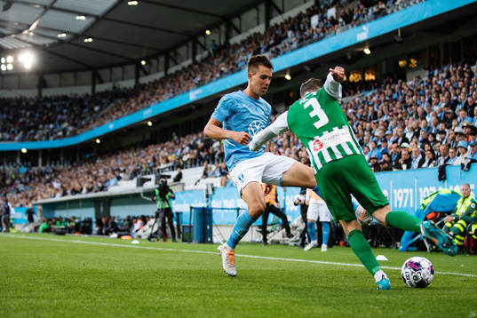Jonas Knudsen of Malmö FF and Mario Pavelic of Zalgiris