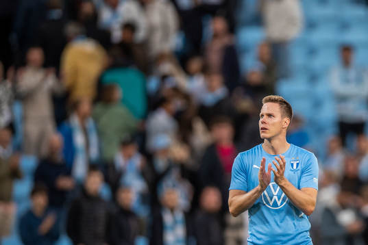 Niklas Moisander of Malmö FF looks dejected the UEFA