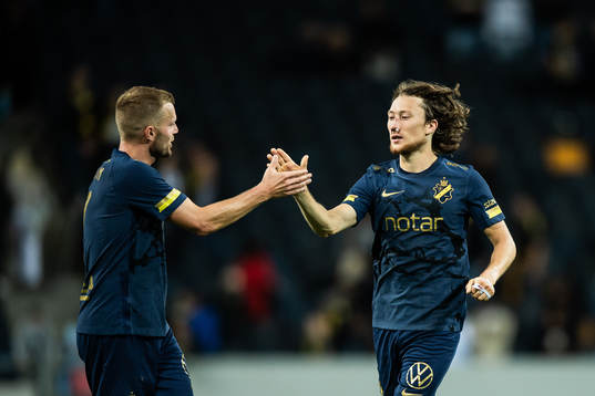 Sebastian Larsson and Axel Björnström of AIK celebrate