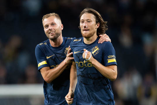 Sebastian Larsson and Axel Björnström of AIK celebrate