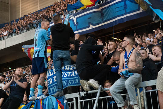 Victor Edvardsen of Djurgården celebrate with supporters