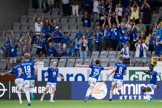 Emil Breivik of Molde celebrates with teammates