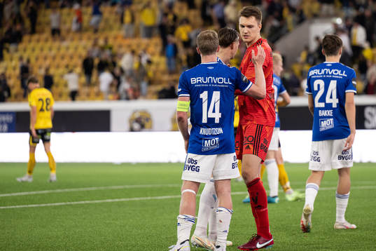 Goalkeeper Jacob Karlstrøm celebrate with teammates