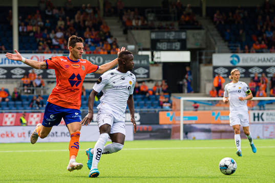 Petar Golubovic of Aalesund and Brice Wembangomo of