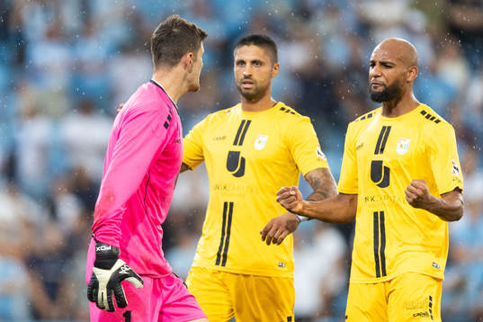 Goalkeeper Lucas Fox and Jules Diouf celebrate