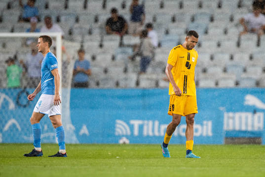 Niklas Moisander of Malmö FF and Filip Bojic of Diddeleng