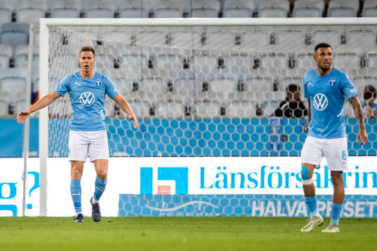 Niklas Moisander and Sergio Pena of Malmö FF