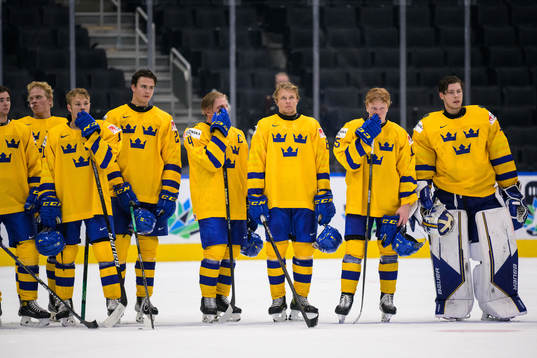 Players of Sweden look dejected
