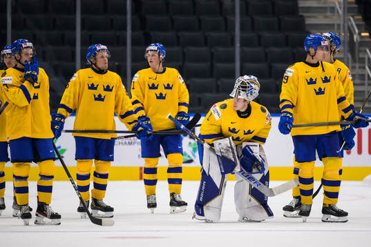 Players of Sweden look dejected