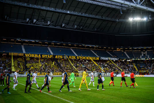 Players of FK Shkendija and of AIK enter the arena