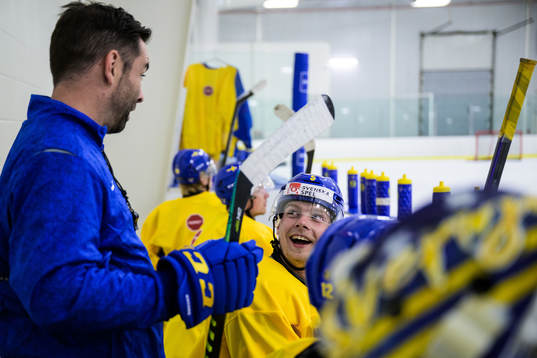 Assistant coach Todd Woodcroft and Anton Olsson of the