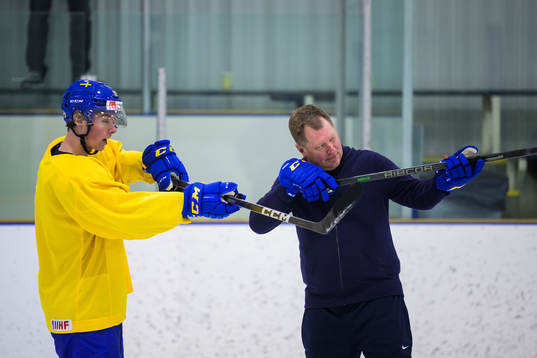 Ludvig Jansson and goaltender coach Peter Andersson of the