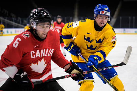 Connor Bedard of Canada and Isak Rosén of Sweden