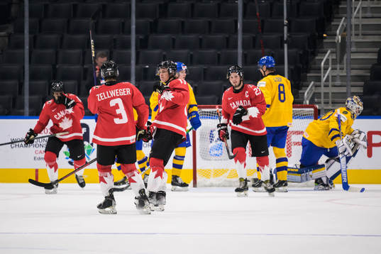 Kent Johnson of Canada celebrates the 3-0 goal