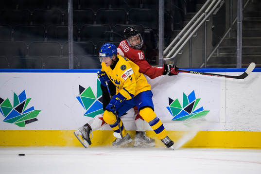 Emil Andrae of Sweden and Connor Bedard of Canada
