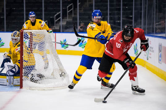Ludvig Jansson of Sweden and Logan Stankoven of Canada