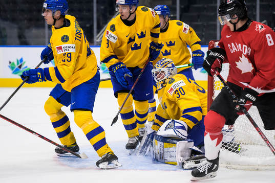 Daniel Torgersson, Helge Grans and goaltender Calle Clang