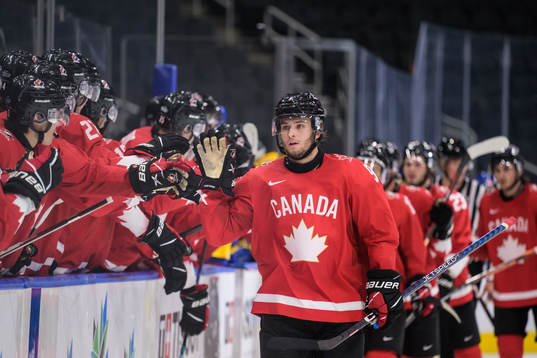 Joshua Roy of Canada celebrates the 4-1 goal