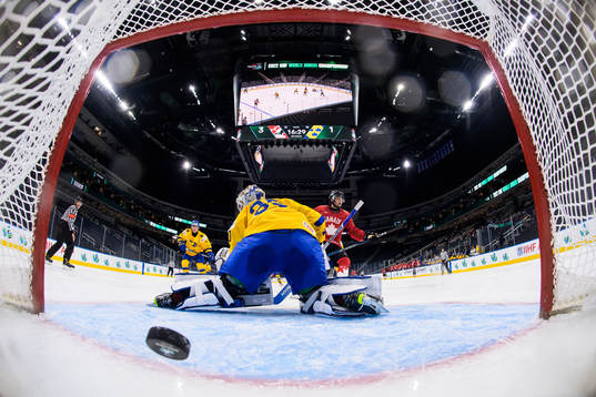 Joshua Roy of Canada celebrates as he scores 4-1 behind