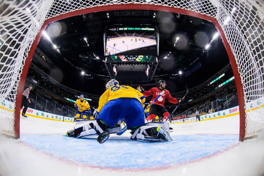 Joshua Roy of Canada celebrates as he scores 4-1 behind