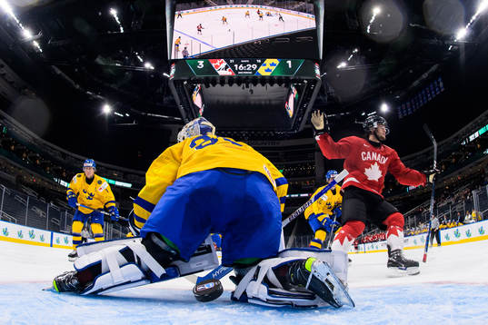 Joshua Roy of Canada celebrates as he scores 4-1 behind