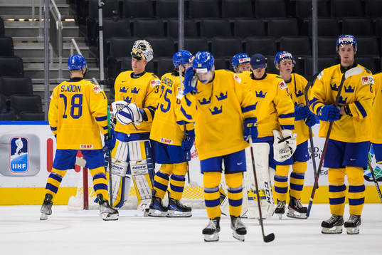 Goaltender Calle Clang of Sweden with teammates look