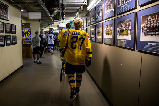Theodor Niederbach of Sweden walks to a practice session