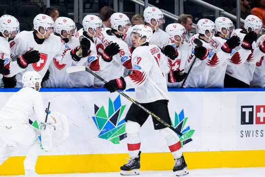Attilio Biasca of Switzerland celebrate with teammates