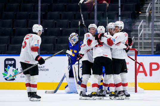 Dario Allenspach of Switzerland celebrate with teammates