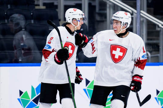 Dario Allenspach and Joshua Fahrni of Switzerland celebrate