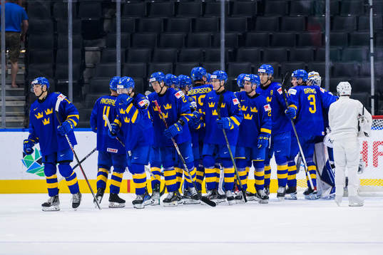 Players of Sweden celebrate