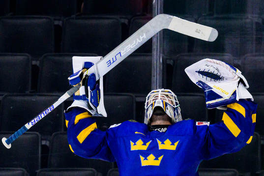Goaltender Jesper Wallstedt of Sweden celebrates