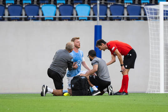 Anders Christiansen of Malmö receives medical treatment