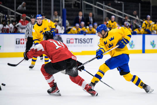 Fabian Lysell of Sweden shoots the puck