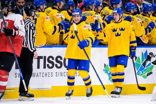Emil Andrae of Sweden celebrates with his teammates