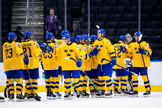 Players of Sweden celebrate