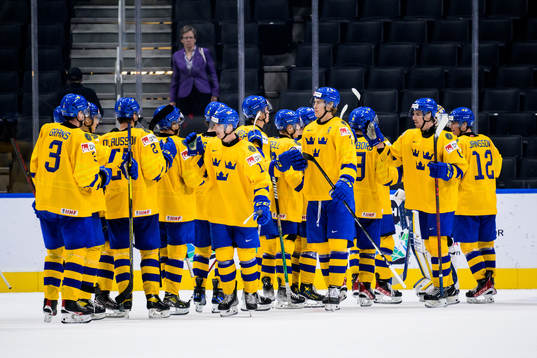 Players of Sweden celebrate