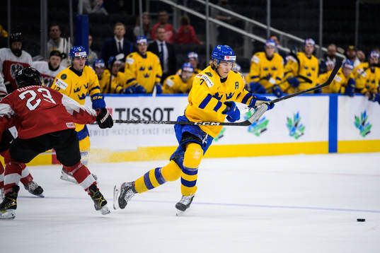 Jonas Dobnig of Austria fails to reach Simon Edvinsson of