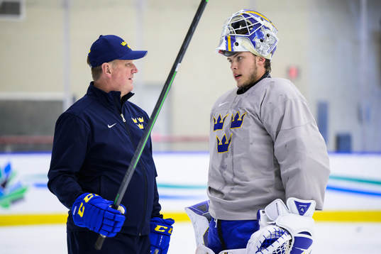 Goaltender coach Peter Andersson and goaltender Jesper