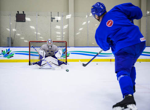 Goaltender Jesper Wallstedt and Emil Andrae of Sweden at a