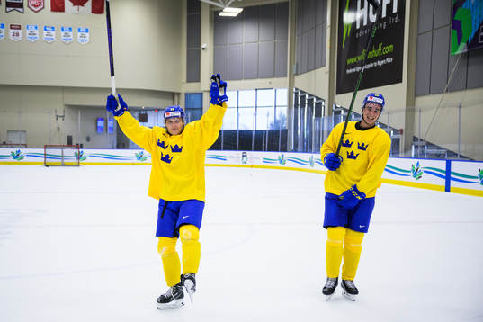 Oskar Magnusson and Daniel Torgersson of Sweden celebrate
